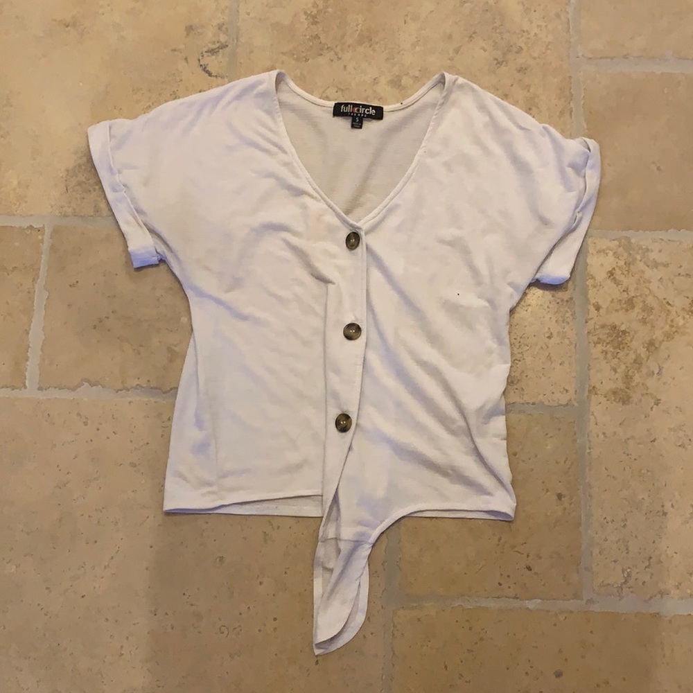 A cute white top in the brand full circle